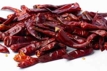 dried chili peppers on white background