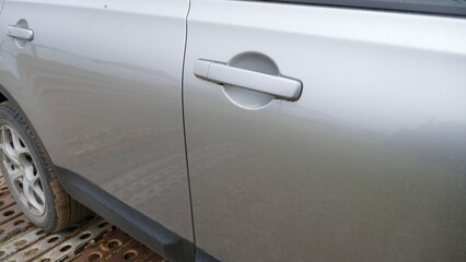door handle of the car on the passenger side