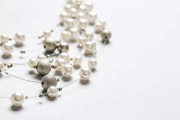 Beautiful necklace on white background