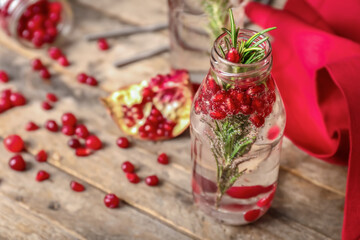 Bottle of healthy cocktail on table