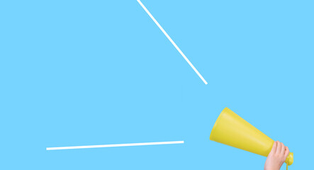 Child's hand and yellow megaphone. 黄色のメガホンと子供の手