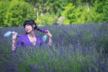 Beautiful Woman Enjoying A Field Of Lavender