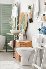 Stylish interior of modern bathroom with toilet bowl