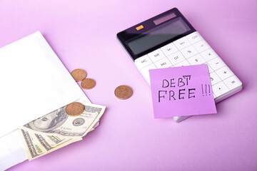 Calculator, money and paper with text DEBT FREE on color background