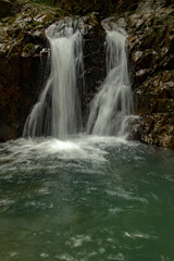 Fototapeta na wymiar Waterfall in the country park in Hong Kong