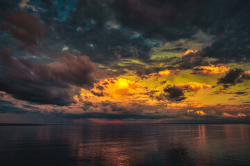 Fototapeta na wymiar Stormy Sunset Clouds over Lake Superior Horizon
