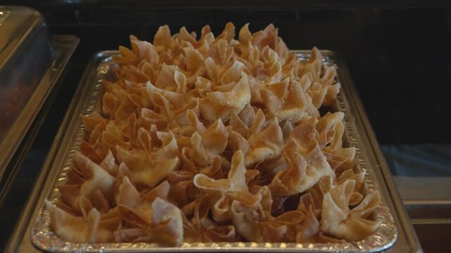Crab Cheese Wontons on a serving plate.