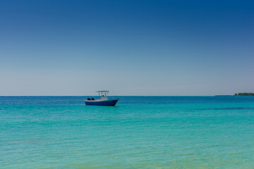 The boat in the Caribbean Sea on a sunny day.