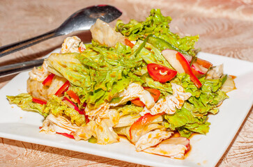 A warm fresh  meat salad for a party