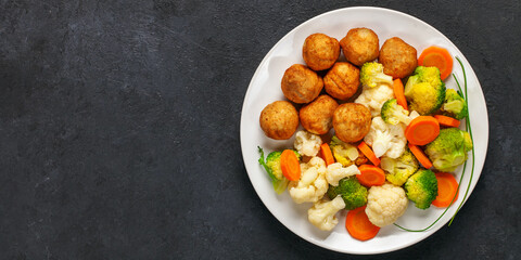 Meatballs with broccoli and a cauliflower