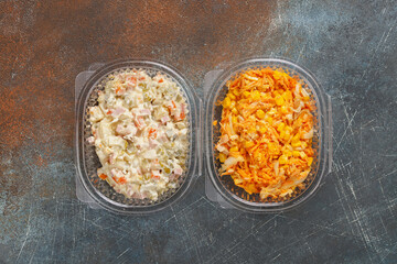 Two salads - Russian salad olivier and carrot salad