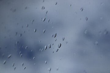 Rain drops on window in winter, macro