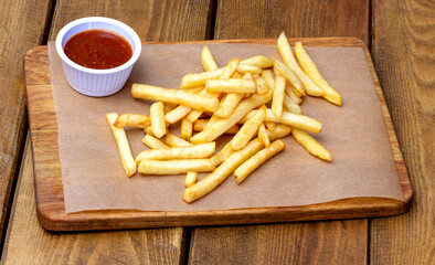 French fries, fast food in a cafe or at home