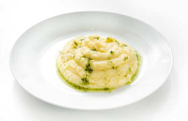 Mashed potatoes, side dish, in a plate, lunch at home or in a cafe, isolate
