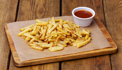 French fries, fast food in a cafe or at home
