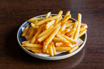 French fries, fast food in a cafe or at home
