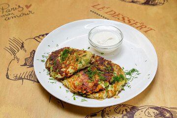 Potato pancakes in a plate, lunch at home or in a cafe