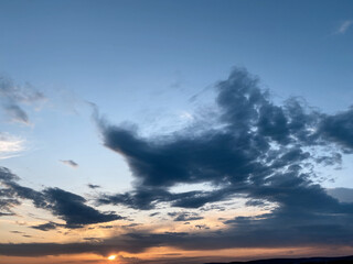 Fototapeta na wymiar Dramatic sky with clouds as a background