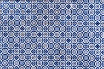 Typical traditional portuguese ceramic titles -Azulejo blue and white ornament, facade wall in Portugal