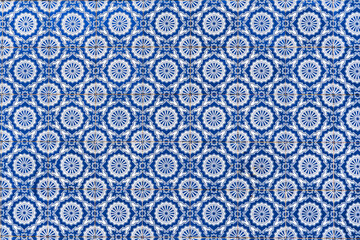 Typical traditional portuguese ceramic titles -Azulejo blue and white ornament, facade wall in Portugal