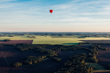 Beautiful bird's-eye views are breathtaking. Hot air balloon flight above the clouds. Unforgettable journey.