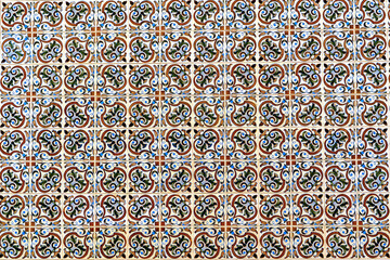 Typical traditional portuguese ceramic titles -Azulejo blue and white ornament, facade wall in Portugal