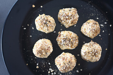 Labane yogurt cheese balls served on a black plate
