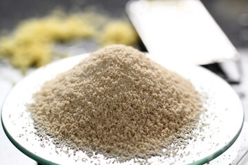 Weighing white breadcrumbs. Making Shoofly Tart Series.