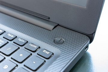 Part of the laptop in the frame on the table