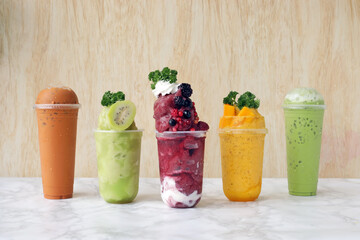 fruit cocktail on the wood background