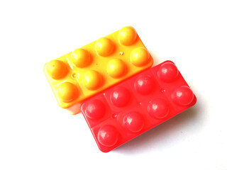 Top view on multi color toy bricks isolated on white  background