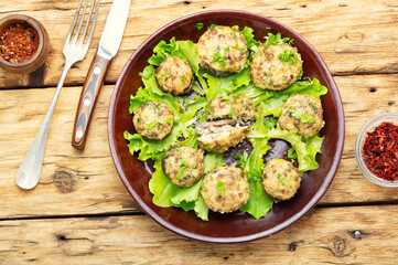 Mushrooms stuffed with meat.