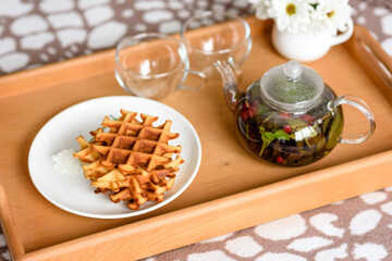 Delicious fresh baked belgian waffles with berries and fruit