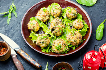 Mushrooms stuffed with meat.