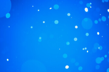Blue glitter bokeh of light.Abstract blurred light
