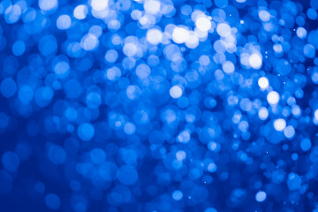 Blue glitter bokeh of light.Abstract blurred light