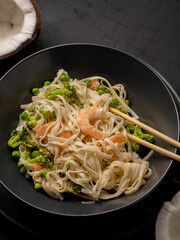 Wok with vegetables and shrimps, with coconut milk