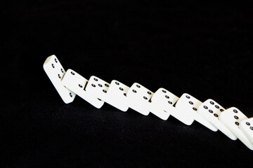 Dominoes on a black background.