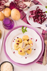 Potato gnocchi stuffed with radicchio and ricotta.
