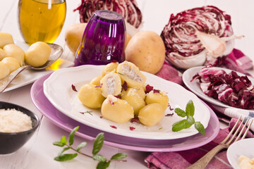 Potato gnocchi stuffed with radicchio and ricotta.
