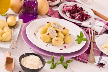 Potato gnocchi stuffed with radicchio and ricotta.
