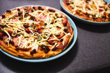 plant-based food, vegan homemade pizzas with veggies and dairy-free cheese