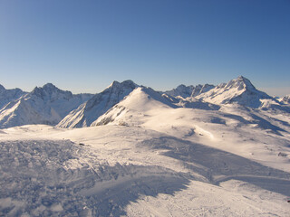 Panoramic view of the mountains of France on a winter sunny day. Haute Savoy, France. Snow Park.