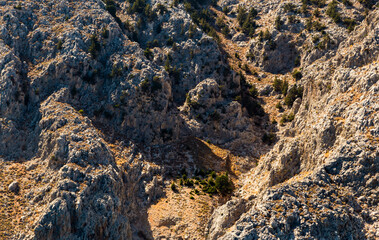 Rock formation showing layers of textured sedimentary rock