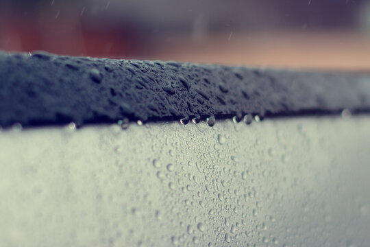 Drops Rain On Pickup car in rainy days.In the rainy season,water drop on the Pickup