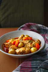 Freshly cooked Filipino food Chicken Afritada or chicken cooked in tomato sauce with potatoes and carrots