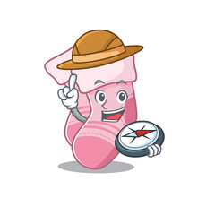 mascot design concept of baby socks explorer using a compass in the forest