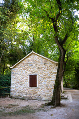 Fototapeta na wymiar Old stone house in a Croatian forest.