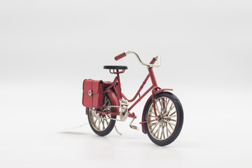 Vintage red bicycle toy Isolated on white background