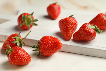 Sweet ripe strawberry on table